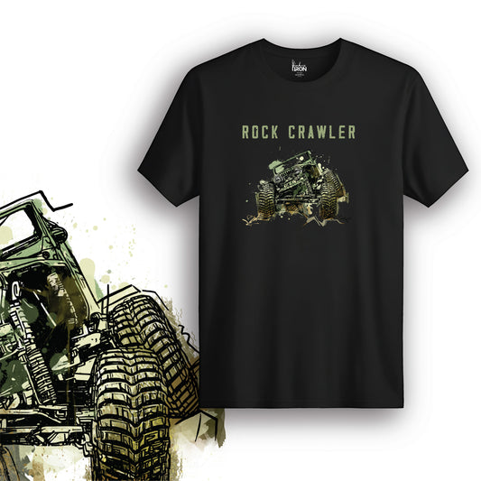 Rock Crawler T-Shirt (Black) – Bold off-road graphic tee featuring a green Jeep tackling rough terrain with splatter effects.