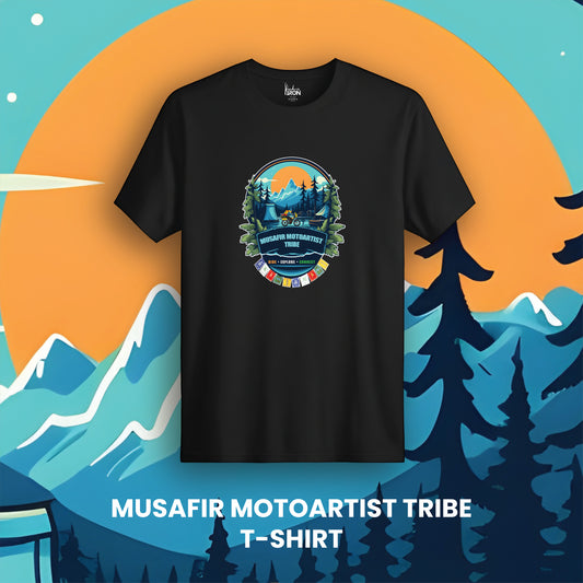 Motorartist Tribe T-Shirt (Black) - Features a circular nature illustration with tents, trees, mountains, and a layered road, all rendered in hand-drawn, vibrant color.
