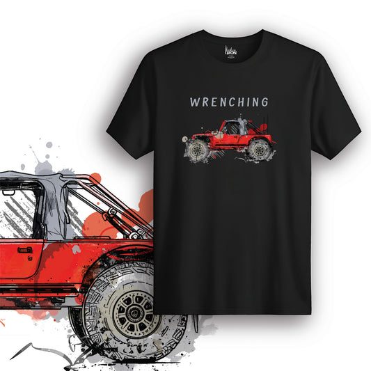 Wrenching T-Shirt (Black) – Off-road mechanic’s tee featuring a bold red Jeep design with a rugged splatter effect and “Wrenching” text.