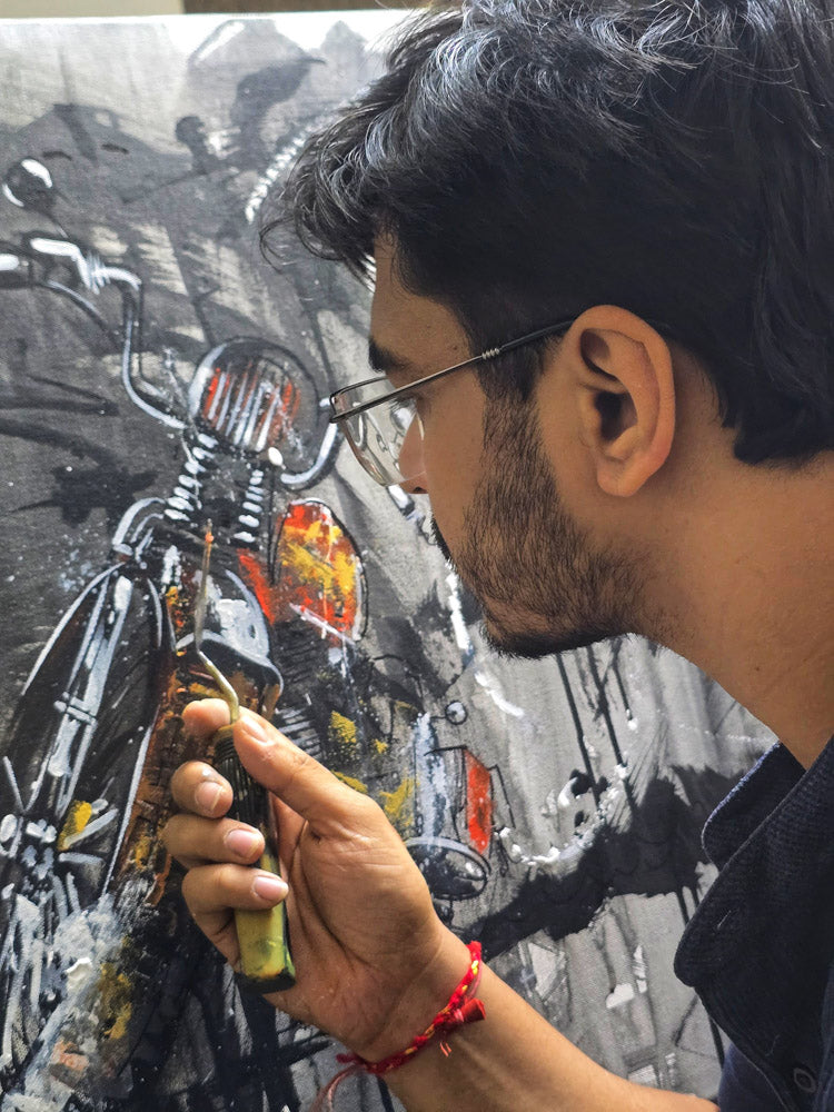 Artist using a palette knife to create a detailed motorcycle painting, showcasing textured, handcrafted artwork inspired by motorbikes. Perfect for motorcycle enthusiasts and art lovers.